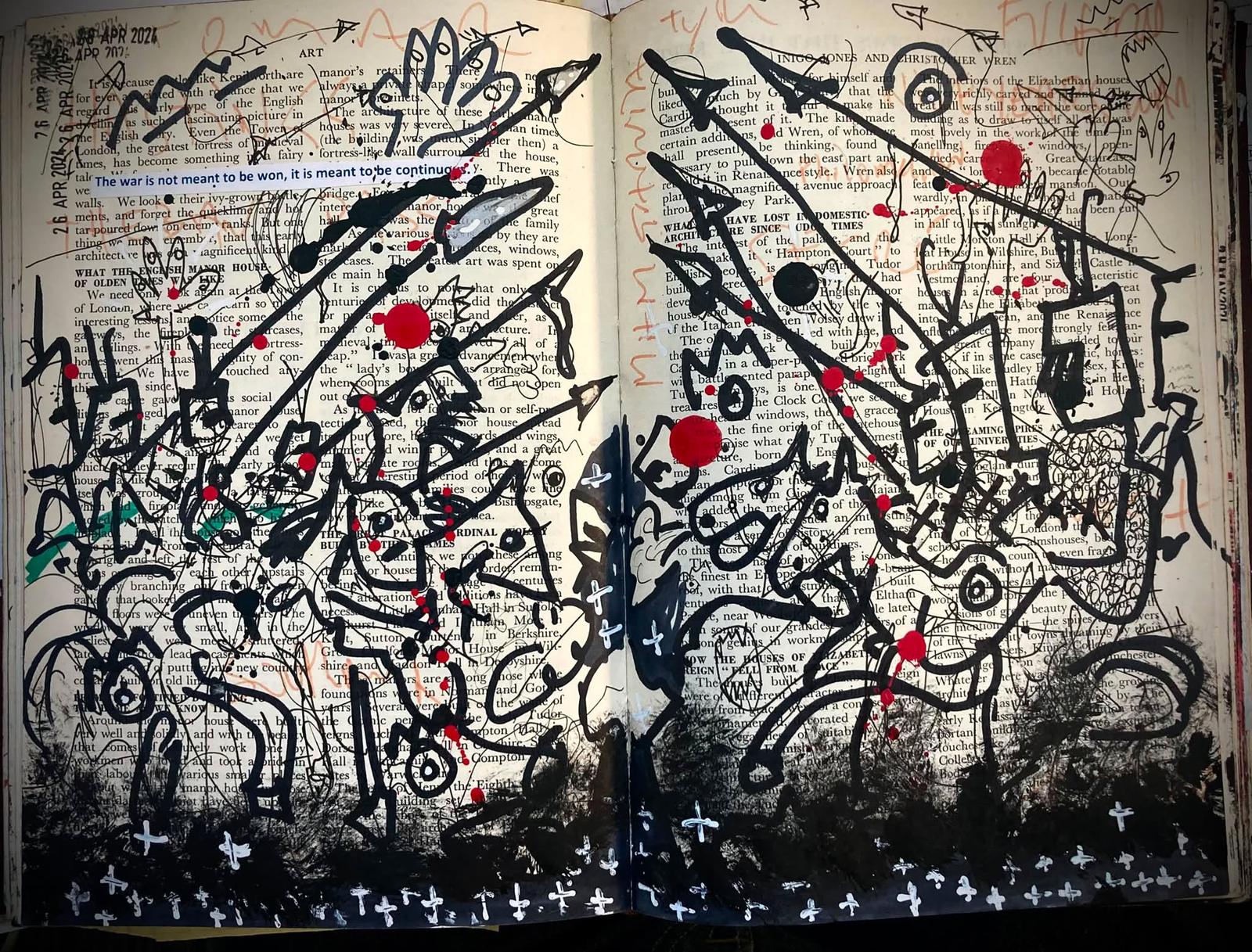 Ink drawings and markings across the pages of an open notebook