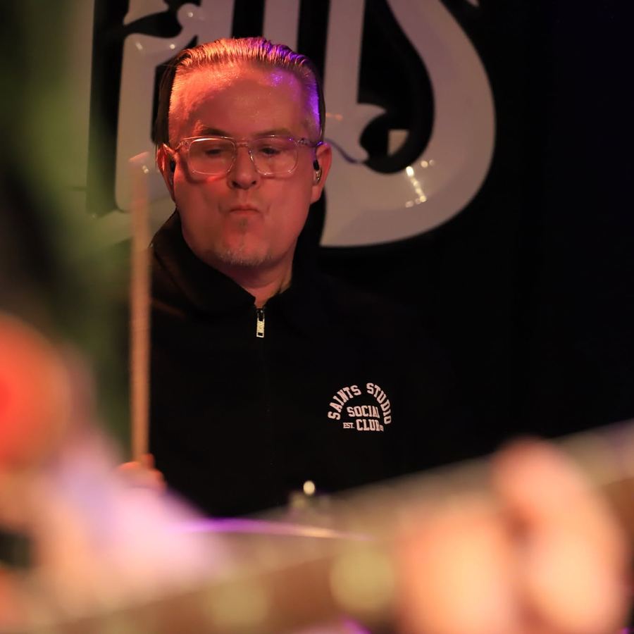 Neil Dorrington on drums